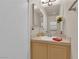 Cozy bathroom features a vanity with mirror, neutral finishes, and decorative accents at 6536 Castor Tree Way, Las Vegas, NV 89108