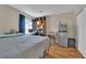 Bright bedroom featuring a workspace with a desk and an organized storage unit at 6536 Castor Tree Way, Las Vegas, NV 89108
