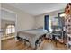 Comfortable bedroom with a dedicated study area and good natural light at 6536 Castor Tree Way, Las Vegas, NV 89108