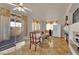 Bright dining room with sliding glass doors and backyard access at 6536 Castor Tree Way, Las Vegas, NV 89108