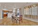 Dining room boasts an open layout to the kitchen and access to the backyard at 6536 Castor Tree Way, Las Vegas, NV 89108