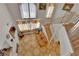 View from above, showing a living room with tile floors, furniture, and a staircase at 6536 Castor Tree Way, Las Vegas, NV 89108