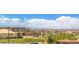 Beautiful community view showcasing green spaces, walking paths, and distant mountain views at 89 Oratorio Dr, Henderson, NV 89015