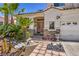 Charming home exterior with well-manicured landscaping, a two-car garage, and inviting curb appeal at 8942 Galena Crossing St, Las Vegas, NV 89123