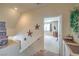Hallway view with stars on the wall leading into a carpeted bedroom with a window at 8942 Galena Crossing St, Las Vegas, NV 89123