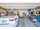 Well-organized two-car garage featuring ample storage space and a clean, tidy environment at 9981 Sable Point St, Las Vegas, NV 89178