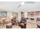 Stylish living room featuring hardwood floors, comfortable seating, and an open floor plan at 9981 Sable Point St, Las Vegas, NV 89178