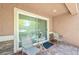 Charming patio with stone accents and comfortable seating perfect for outdoor relaxation at 9981 Sable Point St, Las Vegas, NV 89178