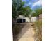 View of stone pathway leading to backyard at 1003 Dover Glen Dr, North Las Vegas, NV 89031