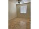 Bedroom with neutral colors and tiled floor at 1003 Dover Glen Dr, North Las Vegas, NV 89031
