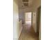 Hallway featuring neutral carpet and bright lighting at 1003 Dover Glen Dr, North Las Vegas, NV 89031