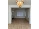 Bright living room featuring tile floors and a view of the front door at 1003 Dover Glen Dr, North Las Vegas, NV 89031