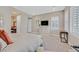 Inviting bedroom with plush carpeting, bright windows, and a serene atmosphere at 10150 Emerald Sunset Ct, Las Vegas, NV 89148