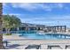 Resort-style pool area with comfortable lounge chairs, shaded structures, and mountain views at 10150 Emerald Sunset Ct, Las Vegas, NV 89148
