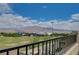 Spacious balcony featuring views of the park, mountain, and beautiful blue skies at 10172 Fire Skye Ave, Las Vegas, NV 89166
