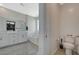 Bright bathroom with double vanity, soaking tub, and separate shower at 10172 Fire Skye Ave, Las Vegas, NV 89166