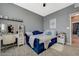Cozy bedroom features modern decor, plush carpet, and stylish furnishings at 10172 Fire Skye Ave, Las Vegas, NV 89166
