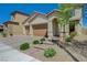 Charming two-story home featuring a three-car garage and well-maintained landscaping at 10172 Fire Skye Ave, Las Vegas, NV 89166