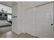 Hallway featuring wood-look tile flooring, neutral colors, and a closet at 10172 Fire Skye Ave, Las Vegas, NV 89166