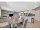 Open-concept living space with living, dining, and kitchen areas that's great for gatherings at 10172 Fire Skye Ave, Las Vegas, NV 89166