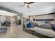 Open-concept kitchen and living area featuring modern finishes, stainless steel appliances, and ample natural light at 10172 Fire Skye Ave, Las Vegas, NV 89166