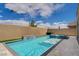 Backyard pool, spa, and blue-glass fire pit at 10172 Fire Skye Ave, Las Vegas, NV 89166