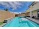 Inviting backyard pool features a raised spa, fountains, and blue tile accents at 10172 Fire Skye Ave, Las Vegas, NV 89166