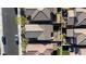 Aerial view of new home construction with a mix of backyard amenities, and manicured front yard landscaping at 10468 Skye Knoll Ave, Las Vegas, NV 89166