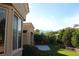 Professionally landscaped backyard with synthetic grass and mountain views at 10732 Cedar Creek Ave, Las Vegas, NV 89134