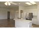Stylish kitchen with stainless steel appliances, granite countertops, and ample lighting at 10732 Cedar Creek Ave, Las Vegas, NV 89134