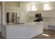 Well-lit kitchen featuring modern appliances and ample countertop space at 10732 Cedar Creek Ave, Las Vegas, NV 89134