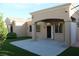 Charming outdoor patio featuring landscaped yard and partially covered space at 10732 Cedar Creek Ave, Las Vegas, NV 89134