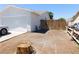 This side yard shows a gate and a path leading to the backyard at 1075 Greymouth St, Las Vegas, NV 89110
