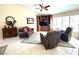 Comfortable living room with plush seating, built-in shelving, and lots of natural light at 11025 Hawk Valley Ave, Las Vegas, NV 89134