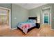 A bedroom with calming walls and flooring create a relaxing and welcoming atmosphere at 112 Kava Kava St, Henderson, NV 89015