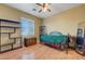 This bedroom with a large window is furnished with shelving and a comfortable bed at 112 Kava Kava St, Henderson, NV 89015