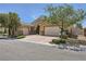 Charming single-story home featuring a well-manicured front yard and a two-car garage at 11253 Sanbury Brook St, Las Vegas, NV 89183