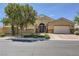 Charming single-story home featuring a well-manicured front yard and a two-car garage at 11253 Sanbury Brook St, Las Vegas, NV 89183