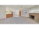 Open floor plan with fireplace, tiled entryway and natural light at 1313 Pinto Rock Ln # 202, Las Vegas, NV 89128