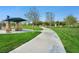 Kellogg Zaher Park walkway and picnic areas for outdoor gatherings at 1313 Pinto Rock Ln # 202, Las Vegas, NV 89128
