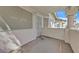 Private patio area with decorative stucco pillars and tile roof detail at 1313 Pinto Rock Ln # 202, Las Vegas, NV 89128