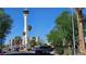 Urban street view featuring Strat Tower surrounded by palm trees and various city buildings at 1414 Rexford Pl, Las Vegas, NV 89104