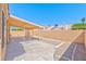 This backyard features a covered patio and a block wall at 1437 Daybreak Dr, Las Vegas, NV 89108