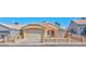 Charming single-story home with a two-car garage, low-maintenance landscaping, and a gated front yard at 1437 Daybreak Dr, Las Vegas, NV 89108