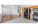Open kitchen with wooden cabinetry, black appliances, and a layout that seamlessly connects to the living area at 1524 Remembrance Hill St, Las Vegas, NV 89144