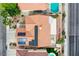 Aerial view showing tile roof, solar panels, covered patio, artificial grass and pool at 1552 Livingston Dr, Henderson, NV 89012