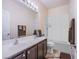This is a bathroom with a double vanity sink and a shower and tub combo at 1552 Livingston Dr, Henderson, NV 89012