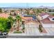 Charming home with a tile roof, solar panels, three-car garage, and well-maintained landscaping at 1552 Livingston Dr, Henderson, NV 89012