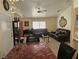 Inviting living room with comfortable seating, tile flooring, and neutral-toned walls at 1821 Windy Gap St, Las Vegas, NV 89106
