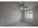 A bright room with a ceiling fan and a window with a window seat at 1865 Woodhaven Dr, Henderson, NV 89074